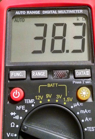 innovative-Ohmmeter-Placed-Across-Two-chip-wires